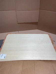 lot 37 image: HAMPTON BAY HAMPTON 0.125X34.5X23.25 IN. BASE CABINET END PANEL IN UNFINISHED BEECH. VARIOUS CONDITIONS. SEE PICTURES