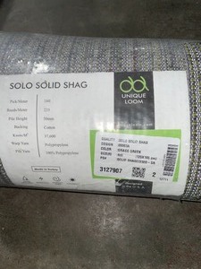 lot 82 image: UNIQUE LOOM SOLID SHAG GRASS GREEN 4 FT. X 6 FT. AREA RUG. SEE PICTURES
