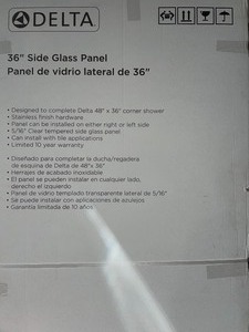 lot 95 image: DELTA 516 IN. X 34.75 IN. X 72 IN. FRAMELESS 1-PIECE DIRECT-TO-STUD CORNER SHOWER GLASS PANEL IN STAINLESS. SEE PICTURES