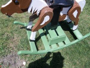 lot 16 image: Painted wooden rocking horse...