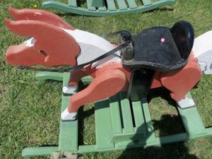 lot 17 image: Redish Brown wooden rocking horse...