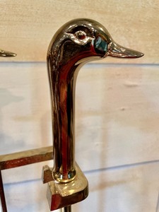 lot 104 image: Golden Duck Head Fireplace Set