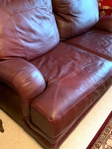 lot 1 image: Burgundy Leather Sofa