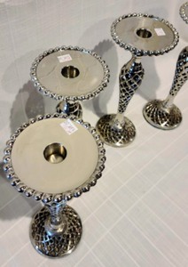 lot 11 image: Decorative Silver Candleholders