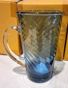 lot 61 image: Four New Pottery Barn Blue Swirled Glass Pitchers