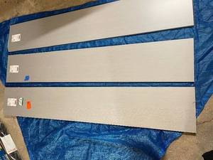 lot 57 image: Rubbermaid Gray Twill Laminated Wood Shelf 12 in. D x 72 in. L