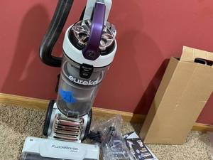 lot 97 image: Eureka FloorRover Dash Upright Vacuum