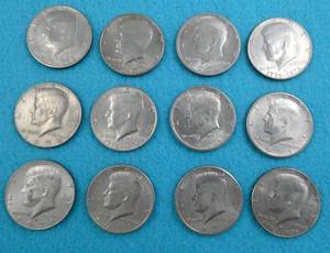 Group of 12 Kennedy Half Dollars from 1971 - 78