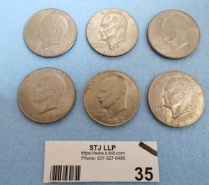 Lot of 7  Eisenhower Dollars various years from 1971-74, including one uncirculated 1973