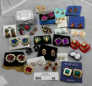 large group of earrings most are post