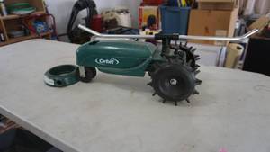 lot 63 image: Orbit Traveling Tractor Sprinkler