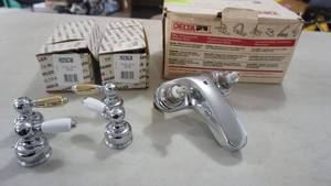 lot 82 image: Delta Bathroom Faucet and 2 Sets of Handles