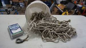 lot 107 image: Rope with Hard Eye Spliced End  New Attwood Braided Dock Line with Spliced End  White Bucket