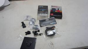 lot 147 image: Wireless 2.1 Amp Dual USB Car Charger  GoPro HDMI Cable  GoPro Auto Charger