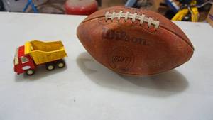 lot 167 image: Wilson The Duke Football  Tonka Jr. Plastic Dump Truck