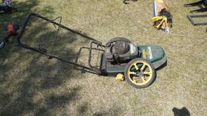 lot 5 image: Yard-Man Walk Behind 5hp 22 String Trimmer