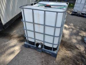lot 283 image: Water Tank with Steel Cage...