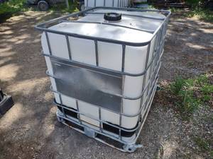 lot 284 image: Water Tank with Steel Cage...