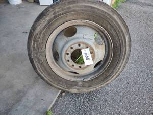 lot 668 image: 10 Bolt Rim & Tire 22570R19.5...