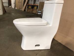 Swiss Madisson Sublime II 1-Piece 0.81.28 GPF Dual Flush Elongated Toilet in White not used see pictures
