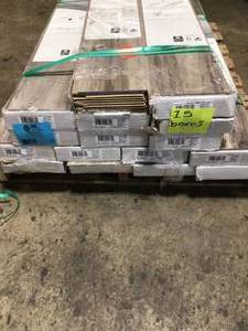 Pallet with 15 boxes of Lakeshore Pecan Bronze 7 mm Thick x 7-23 in. Wide x 50-58 in. Length Laminate Flooring (24.17 sq. ft.  case) not used see pictures