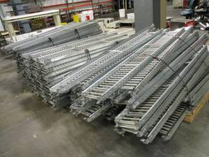 lot 50 image: Metal Roller Conveyer 7ft Section Lot of 105 Sections