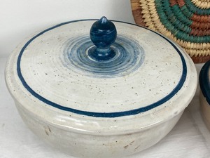 lot 9 image: (2) Covered Pottery Dishes and a Trivet