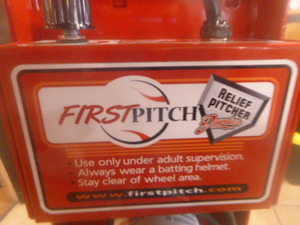 lot 4 image: First Pitch Relief Pitcher Junior Pitching Machine