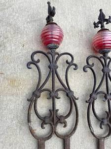 lot 131 image: 2 Heavy Metal Lawn Decorations With Glass Balls