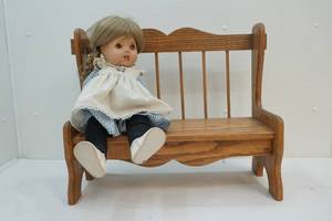 Vintage doll, bench