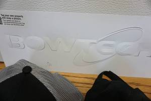 lot 92 image: Bowtech Decal With Rough Rider and Arrow Dynamic Solutions Baseball Caps