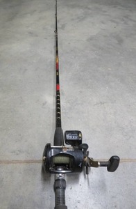 lot 5 image: CABELAS DEPTH MASTER 11 AND ZEBCO ZRC56MG CASTING MODEL ROD