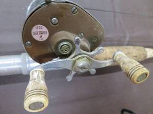 lot 8 image: VINTAGE SHORE ROD AND REEL