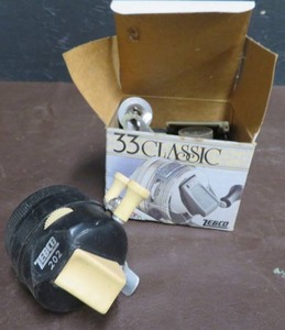 lot 28 image: VINTAGE ZEBCO 202 PLUS A VINTAGE ZEBCO BOX WITH PARTS OF A ZEBCO.