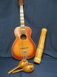 lot 54 image: GUITAR,VINTAGE MARACAS, AND MARACA SHAKER RAIN STICK