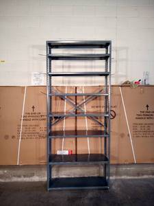 lot 2 image: 85 x 36 x 12 - 8 shelf metal storage rack with adjustable shelves.
