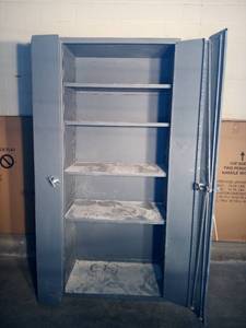 lot 35 image: 84 x 36 x 24.5 Huge bi folding door storage unit.  Very heavy