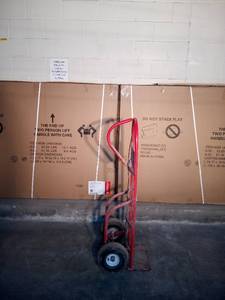 lot 36 image: Heavy duty red dolly made to last - tires are flat