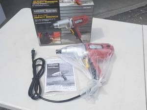 lot 10 image: Brand New in Box 12 Electric Chicago Impact Drill