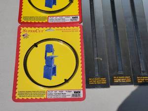 lot 12 image: Brand New (5) 12 Planer Blades & (4) 93-12 Band Saw Blades