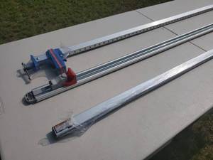 lot 51 image: (2) Aluminum Woodworking Clamps & (1) Aluminum Guide