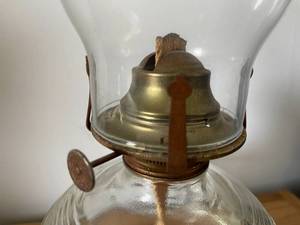 lot 100 image: Vintage Clear Glass Oil Lamp