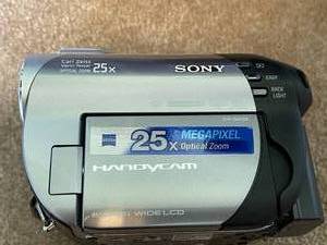 lot 149 image: Sony 25X Megapixel Optical Zoom Handy-Cam And Case