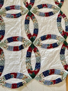 lot 202 image: Quilt with Circular Design