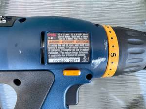 lot 375 image: Ryobi Rechargeable Drill With Charger and Two New Batteries