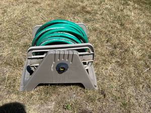 lot 377 image: Wall Mount Hose Reel With Hose