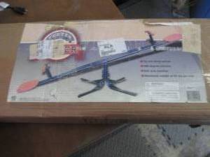 lot 213 image: Teeter Totter open box...