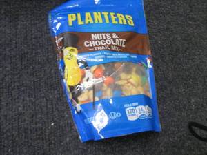 lot 331 image: 5- 6 oz Planters Trail Mix...