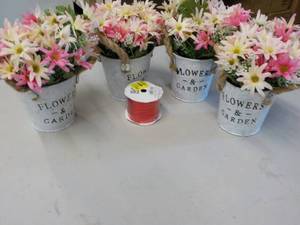 Artificial flowers in Galvanized Bu...