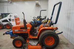 lot 8 image: Early 1990s Kioti Model LB1714 Compact Utility Tractor